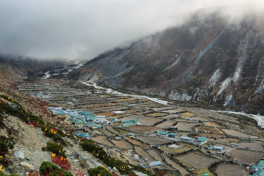 Dingboche village with clouds approaching